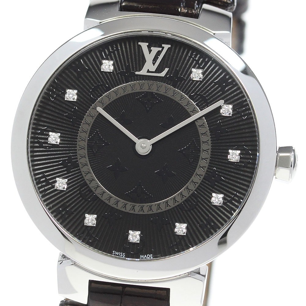 Louis Vuitton QA144 Tambour Slim MM Quartz Ladies Wristwatch: Louis Vuitton QA144 Tambour Slim MM Quartz Ladies Wristwatch A pre-owned Louis Vuitton Tambour Slim MM women's quartz wristwatch with 11 diamonds. The watch is identified as model QA144 and is noted a