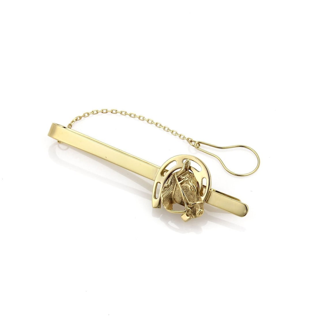 Carrera y Carrera 18k Yellow Gold Tie Clip with Horse and Horseshoe Motif: Carrera y Carrera 18k Yellow Gold Tie Clip with Horse and Horseshoe Motif Signed Carrera y Carrera men's tie bar/clip featuring a horse shoe and horse motif. Crafted in 18k yellow gold and marked 750 