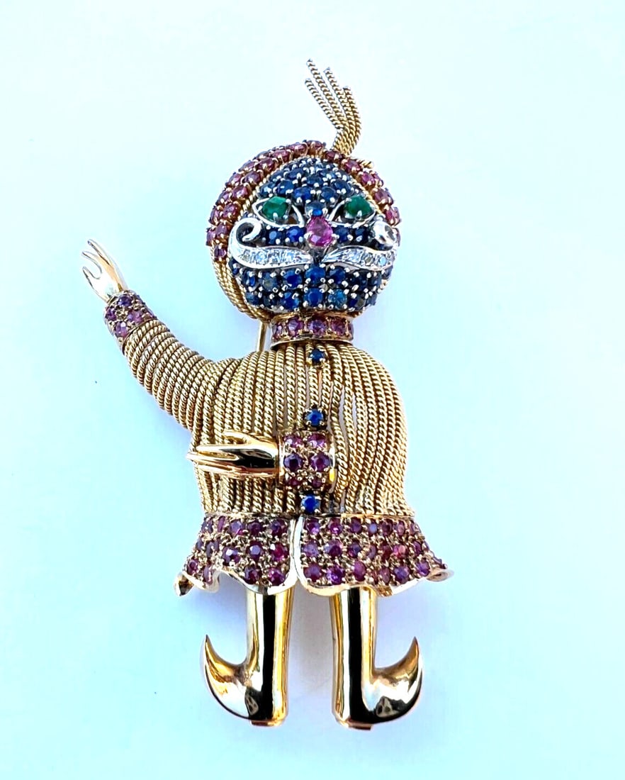 14K Gold S.H.CHAN Gemstone Brooch with Diamonds Rubies Sapphires Emeralds: 14K Gold S.H.CHAN Gemstone Brooch with Diamonds Rubies Sapphires Emeralds This exquisite brooch by S.H.CHAN combines vibrant gemstones and fine craftsmanship. Crafted in 14K yellow and white gold, it 