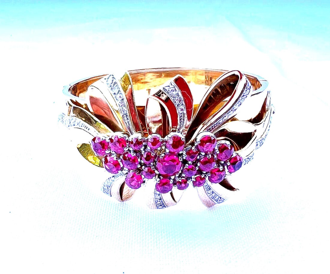 1960s Retro French 18K Gold Platinum Diamond Ruby Bangle Bracelet: 1960s Retro French 18K Gold Platinum Diamond Ruby Bangle Bracelet This stunning retro French bracelet from the 1960s is crafted from 18K rose gold and platinum, showcasing exquisite design and craftsm