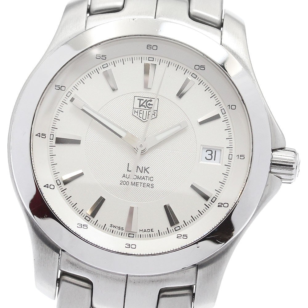 TAG Heuer Link Date Automatic Stainless Steel Men's Wristwatch WJF2111: TAG Heuer Link Date Automatic Stainless Steel Men's Wristwatch WJF2111 This TAG Heuer Link Date men's wristwatch features a stainless steel case and band, complemented by a silver dial. The watch is p