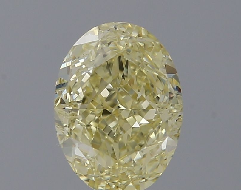 Loose Diamond - OVAL 1.01ct Fancy Light Yellow VS1: Loose Diamond - OVAL 1.01ct Fancy Light Yellow VS1 Source: Natural Shape: OVAL Carats: 1.01 Color: Fancy Light Yellow Certification: GIA Video: