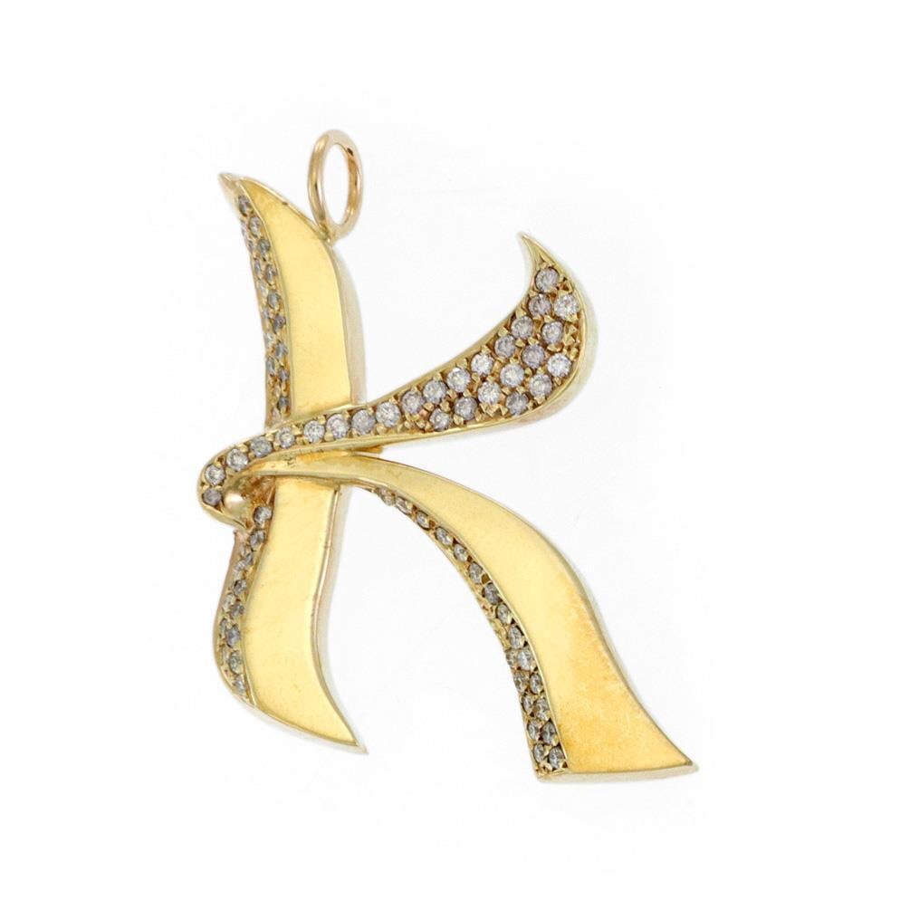 Diamond Letter K Pendant in 14k Yellow Gold 1 Carat: Diamond Letter K Pendant in 14k Yellow Gold 1 Carat This exquisite pendant features a stylish letter 'K' design, meticulously crafted from 14k yellow gold with a polished finish. Adorned with a collec