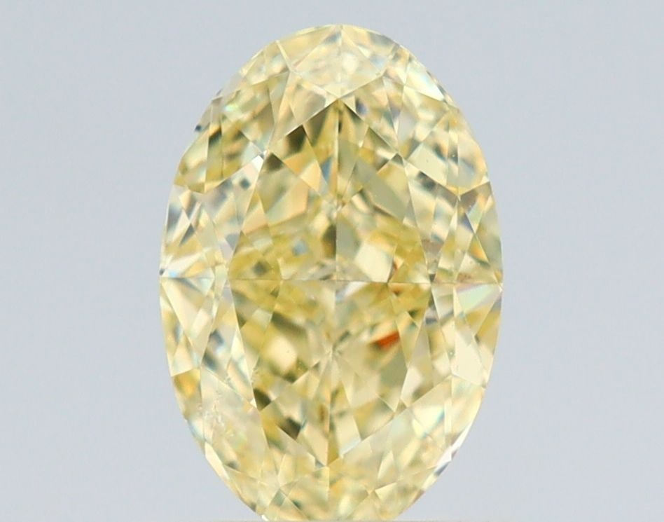 Loose Diamond - OVAL 1.01ct Fancy Light Yellow SI2: Loose Diamond - OVAL 1.01ct Fancy Light Yellow SI2 Source: Natural Shape: OVAL Carats: 1.01 Color: Fancy Light Yellow Certification: GIA Video: