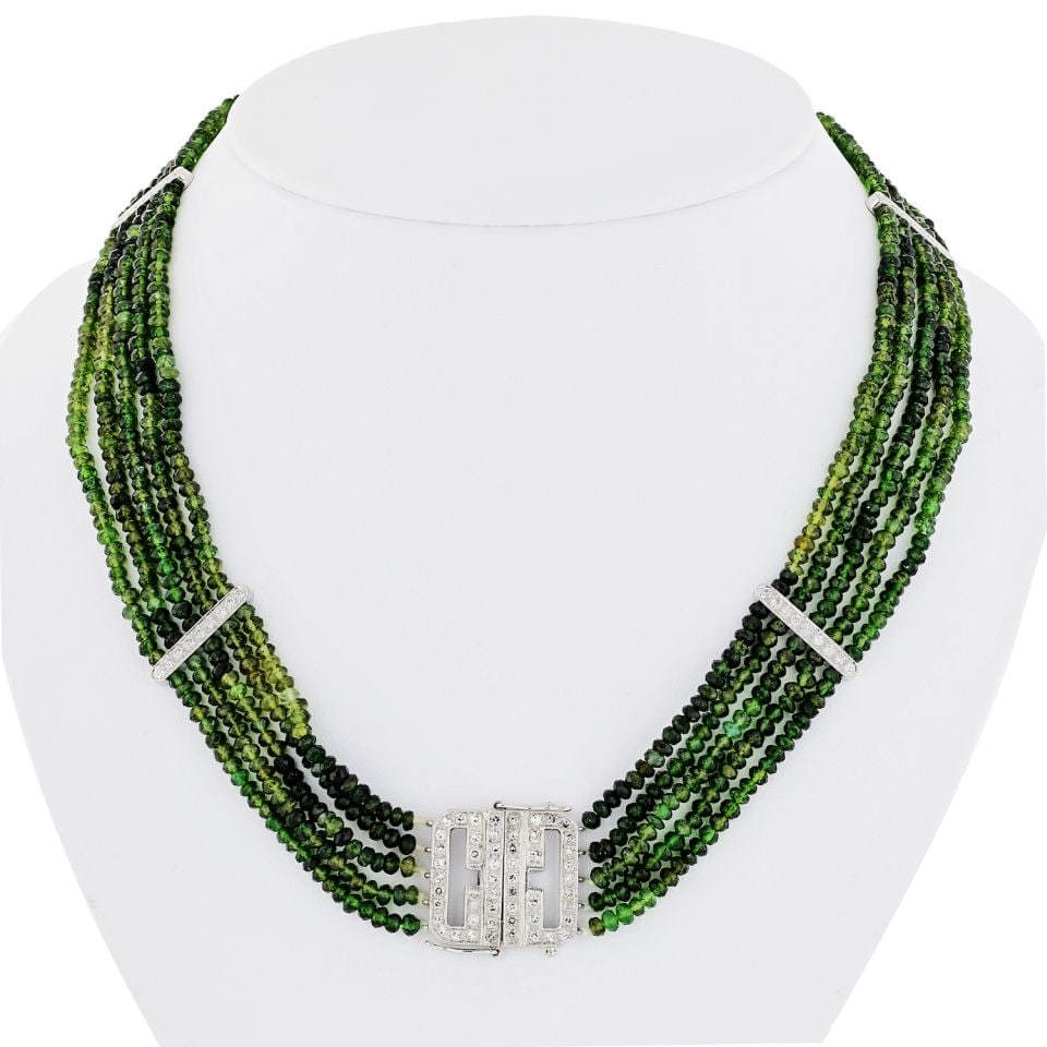 Platinum Multi Strand Green Tourmaline Diamond Necklace 2 Cts 5 Strands: Platinum Multi Strand Green Tourmaline Diamond Necklace 2 Cts 5 Strands This exquisite necklace features a stunning assembly of green tourmaline and diamonds, elegantly crafted in platinum. The neckla