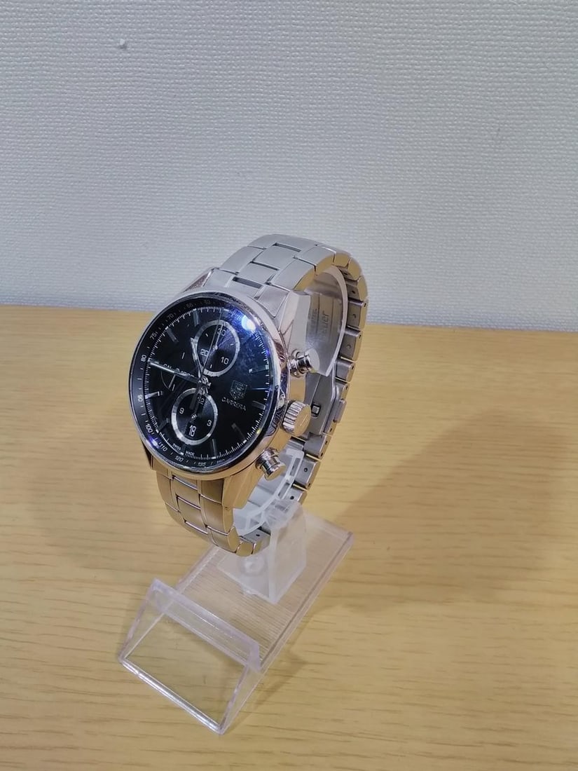 TAG Heuer CAR2110-4 EPN6829 Carrera automatic mens chronograph watch: TAG Heuer CAR2110-4 EPN6829 Carrera automatic mens chronograph watch Pre-owned TAG Heuer Carrera automatic chronograph men's wristwatch. The watch is described as Swiss-made and identified as a wristw
