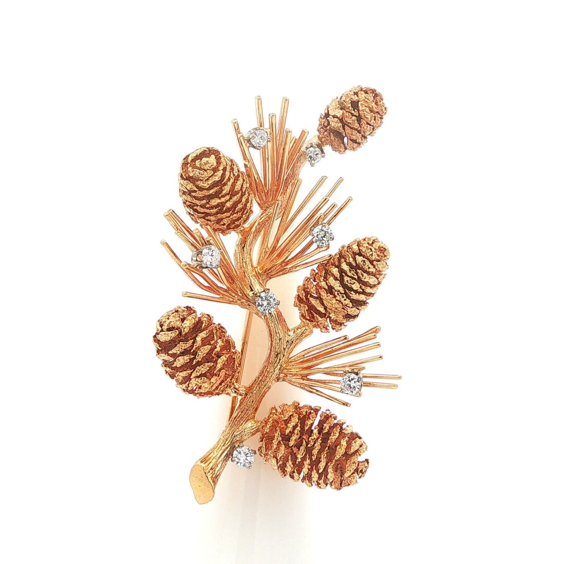 Diamond Pine Cone Brooch in 13 14K Yellow Gold: Diamond Pine Cone Brooch in 13 14K Yellow Gold This highly detailed pine cone cluster branch pin brooch is crafted from solid 13-14K yellow gold with white gold diamond baskets. It features seven natu
