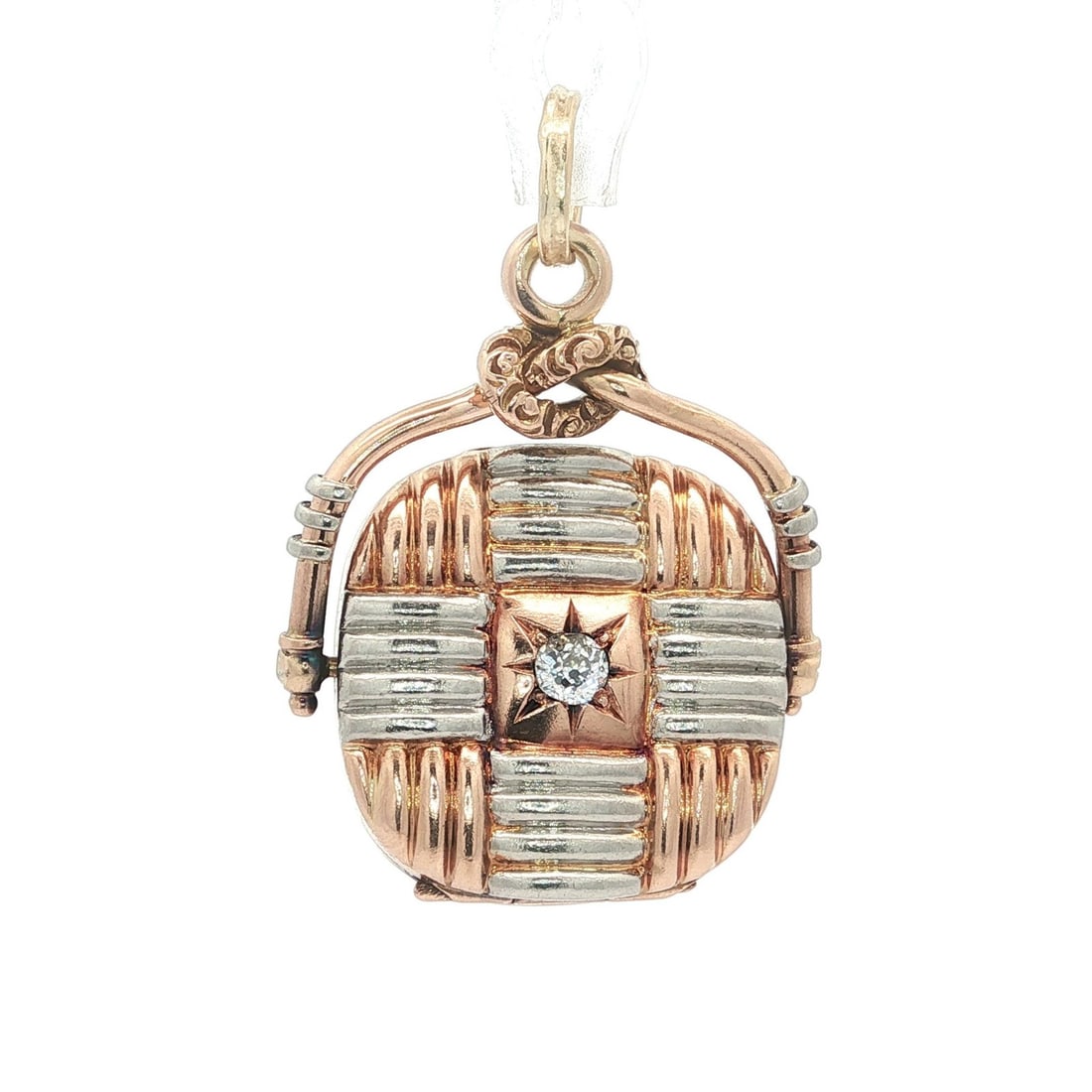 Victorian Gold Platinum Diamond Swivel Locket 0.14ct Antique Design: Victorian Gold Platinum Diamond Swivel Locket 0.14ct Antique Design This exquisite Victorian locket features a solid 12-14k gold construction adorned with platinum accents and a stunning old mine cut 