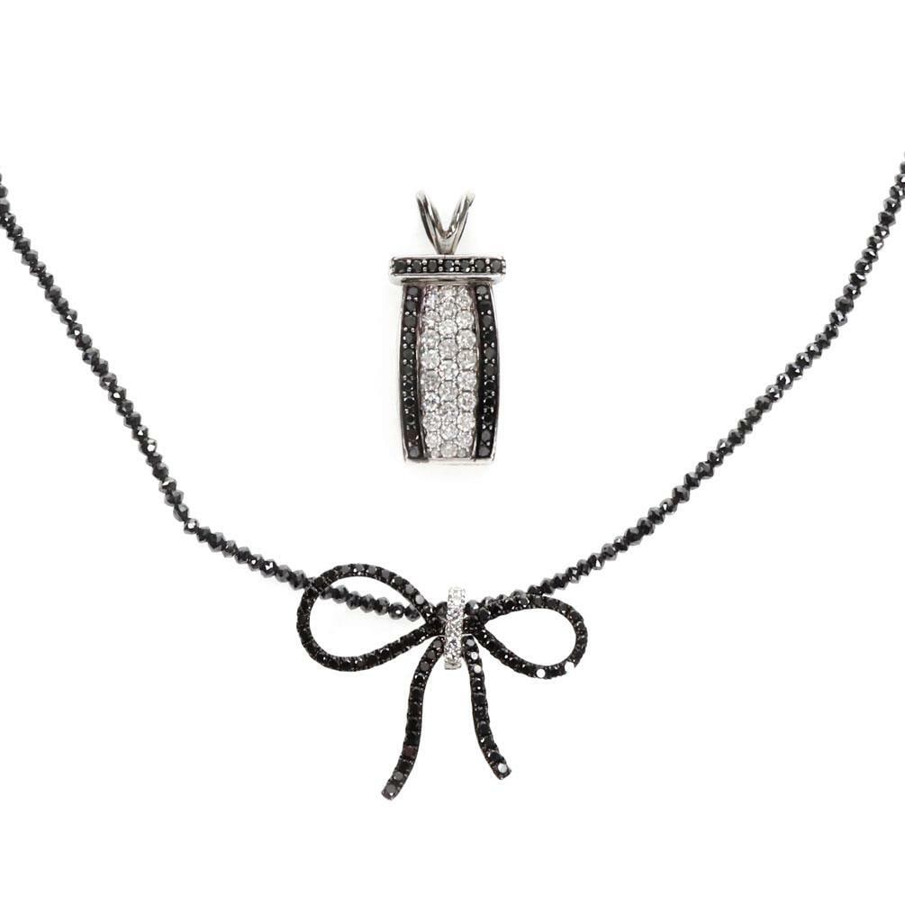 Interchangeable 10.50ct Black Diamond Necklace with 14k and 18k Gold Pendants: Interchangeable 10.50ct Black Diamond Necklace with 14k and 18k Gold Pendants This exquisite interchangeable necklace features two stunning pendants, elegantly crafted from 14k and 18k white gold. The