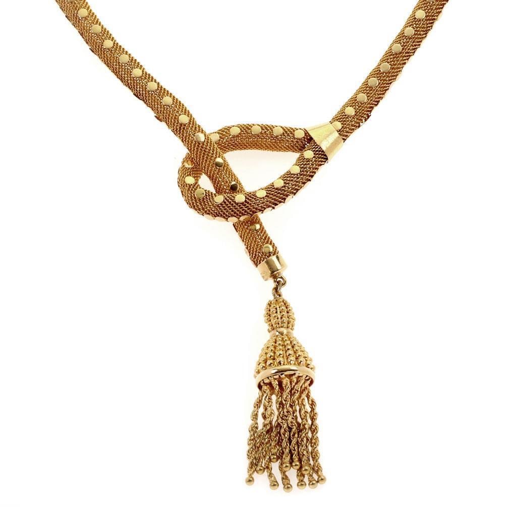 Vintage 21k Yellow Gold Lariat Necklace with Tassel Pendant: Vintage 21k Yellow Gold Lariat Necklace with Tassel Pendant This stunning lariat-style necklace is crafted from luxurious 21k yellow gold, featuring a flexible 5.5mm hollow mesh tube adorned with poli