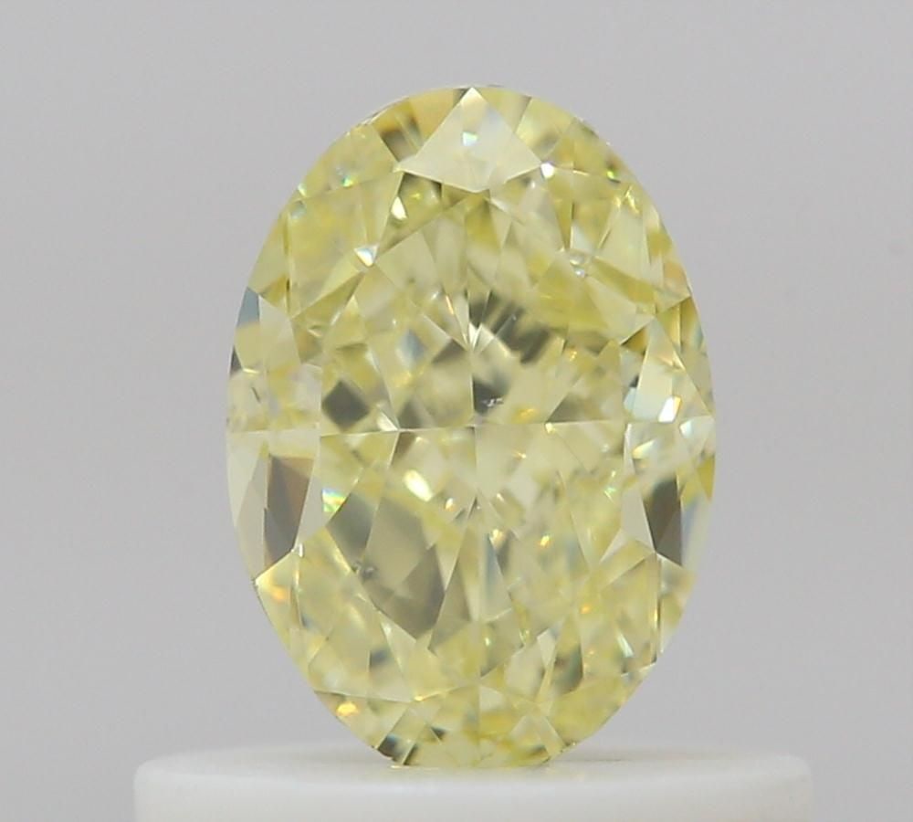 Loose Diamond - OVAL 0.7ct Fancy Light Yellow VS2: Loose Diamond - OVAL 0.7ct Fancy Light Yellow VS2 Source: Natural Shape: OVAL Carats: 0.7 Color: Fancy Light Yellow Certification: GIA Video:
