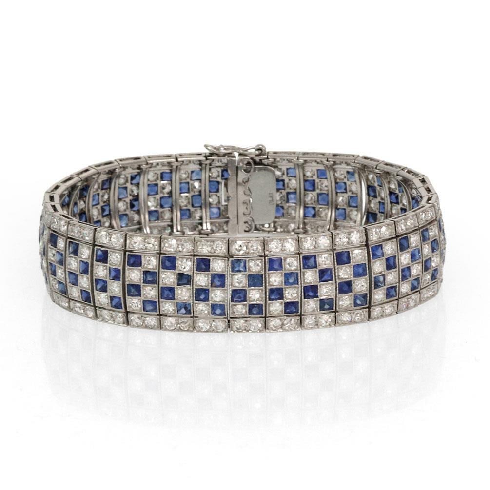 Art Deco Platinum Bracelet 15ct Diamond 8ct French Cut Sapphire: Art Deco Platinum Bracelet 15ct Diamond 8ct French Cut Sapphire This stunning Art Deco bracelet is a true masterpiece, featuring a luxurious combination of old mine cut diamonds and French cut sapphir