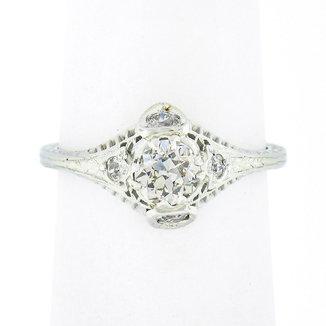 Antique Art Deco 18k White Gold Diamond Solitaire Engagement Ring: Antique Art Deco 18k White Gold Diamond Solitaire Engagement Ring This exquisite Antique Art Deco engagement ring features a stunning 0.43ct Old European cut diamond, intricately set in solid 18k whit