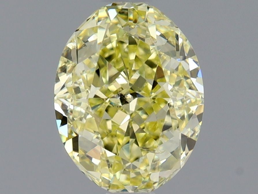 Loose Diamond - OVAL 1.01ct Fancy Yellow SI2: Loose Diamond - OVAL 1.01ct Fancy Yellow SI2 Source: Natural Shape: OVAL Carats: 1.01 Color: Fancy Yellow Certification: GIA Video: