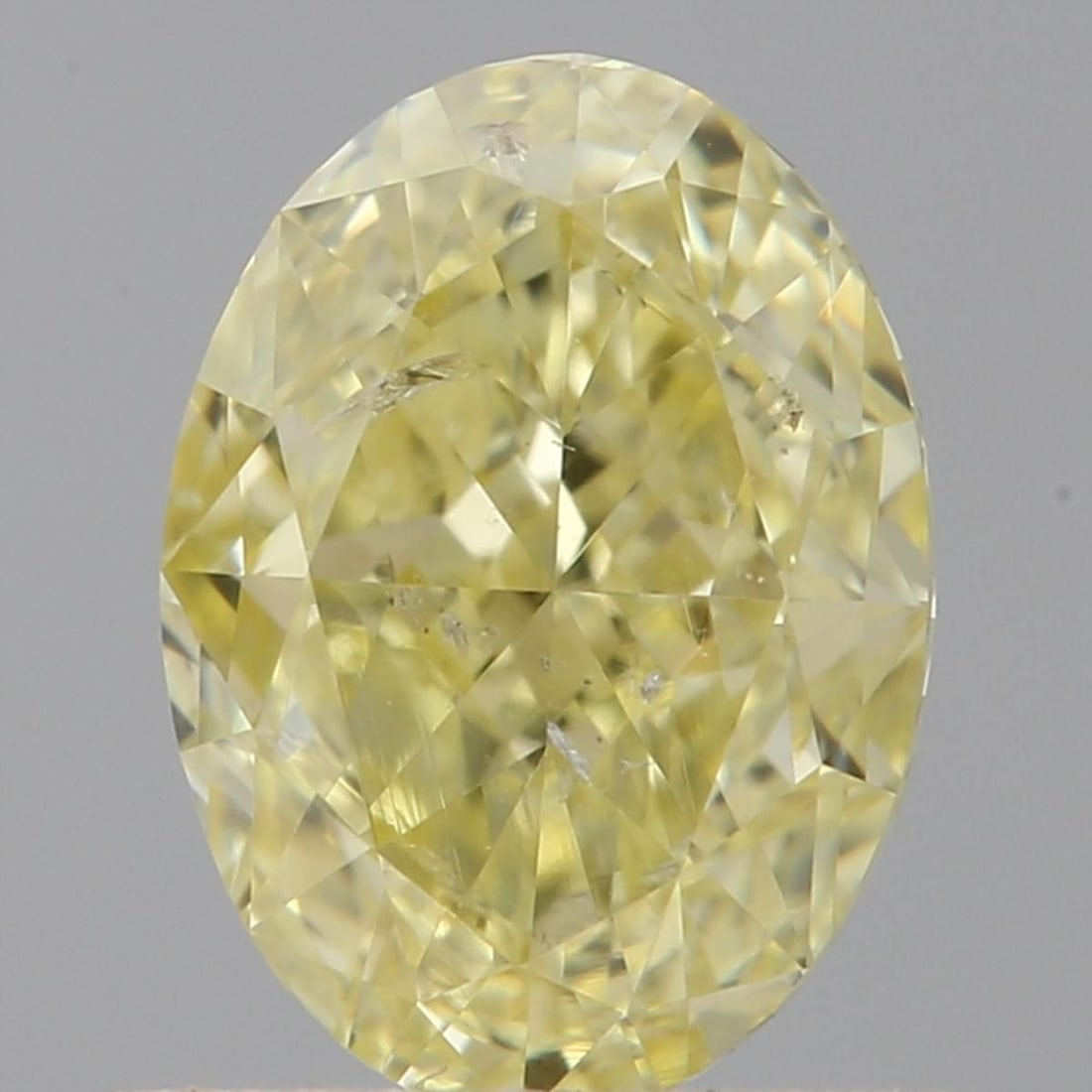 Loose Diamond - OVAL 0.71ct Fancy Intense Yellow I1: Loose Diamond - OVAL 0.71ct Fancy Intense Yellow I1 Source: Natural Shape: OVAL Carats: 0.71 Color: Fancy Intense Yellow Certification: GIA Video: