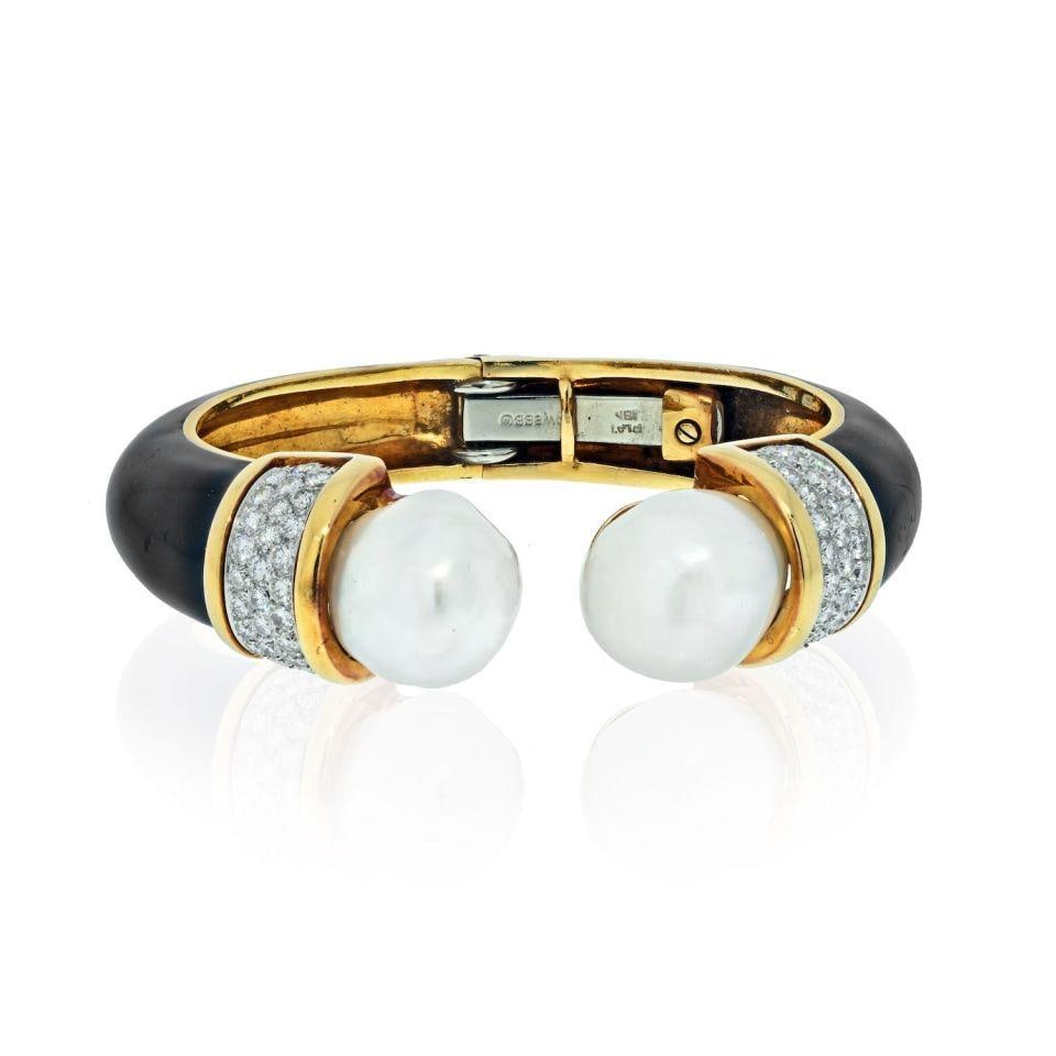 David Webb 1970s Platinum 18K Yellow Gold Pearl Diamond Cuff Bracelet: David Webb 1970s Platinum 18K Yellow Gold Pearl Diamond Cuff Bracelet Elevate your accessory collection with this stunning David Webb bracelet, a bold piece that combines the elegance of platinum and 