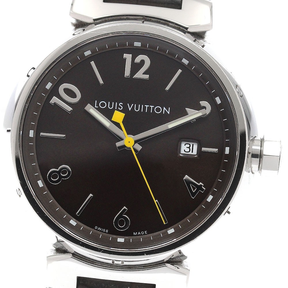Louis Vuitton Tambour quartz date men's wristwatch Q1111: Louis Vuitton Tambour quartz date men's wristwatch Q1111 This is a pre-owned Louis Vuitton Tambour Date Quartz men's wristwatch, model Q1111. The watch features a stainless steel case paired with a br
