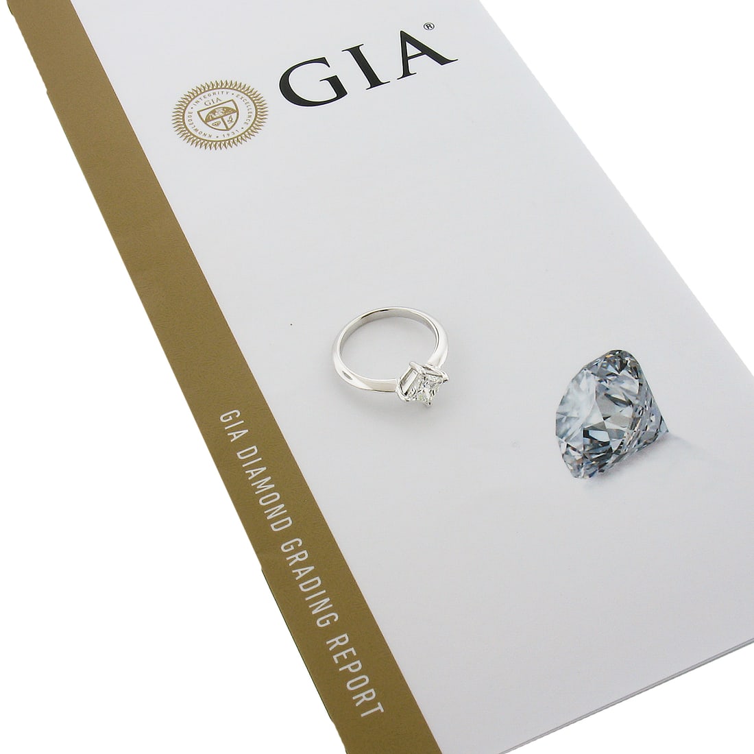 18k White Gold Princess Diamond Solitaire Ring GIA Certified 1.10ct Size 6.5: 18k White Gold Princess Diamond Solitaire Ring GIA Certified 1.10ct Size 6.5 This un-used engagement ring features a GIA-certified 1.10 carat princess cut natural diamond, prong set in solid 18k white