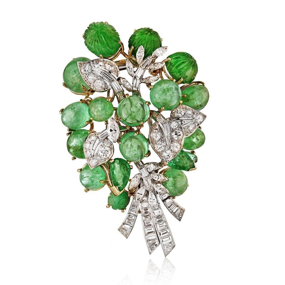 David Webb Platinum 18K Gold Emerald Diamond Brooch Circa 1960s: David Webb Platinum 18K Gold Emerald Diamond Brooch Circa 1960s This exquisite David Webb brooch showcases a stunning combination of platinum and 18K yellow gold, weighing 65.9 grams. Measuring approx