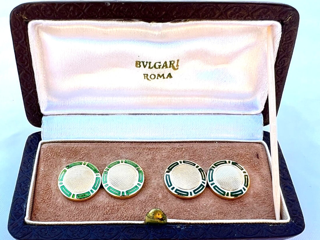 Bvlgari 18K Yellow Gold Enameled Cufflinks with Box: Bvlgari 18K Yellow Gold Enameled Cufflinks with Box Elevate your formal attire with this exquisite pair of Bvlgari cufflinks, crafted from luxurious 18K yellow gold. Each cufflink showcases stunning e