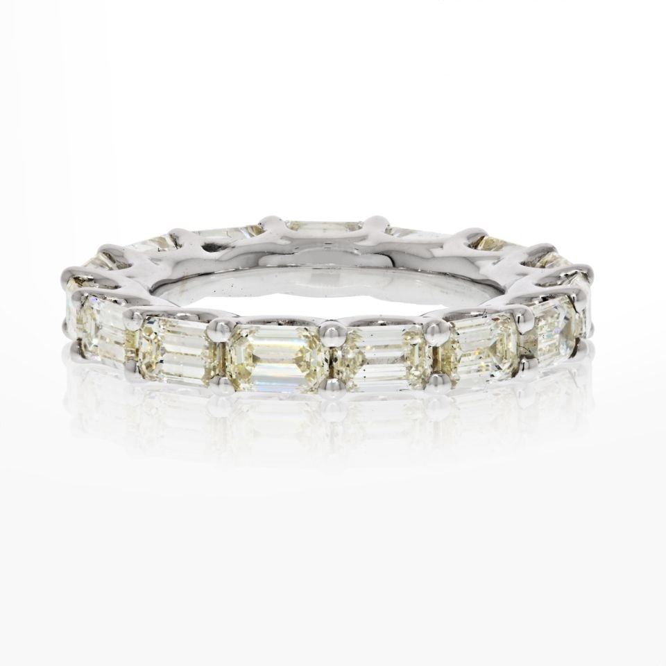 5.50cts Emerald Cut Diamond Eternity Band in 14K White Gold: 5.50cts Emerald Cut Diamond Eternity Band in 14K White Gold This stunning 5.50cts Horizontal Emerald Cut Diamond Eternity Band is crafted in luxurious 14K white gold, making it a perfect addition to a