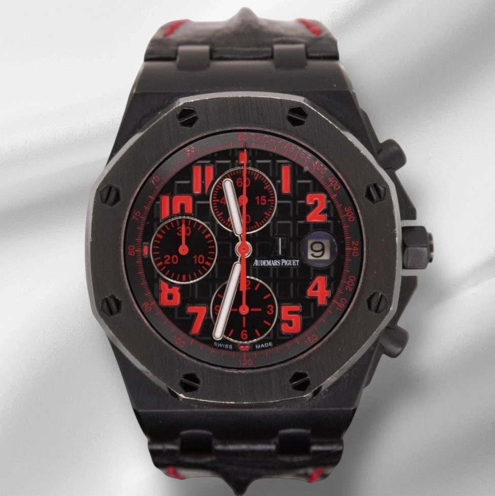 Royal Oak Offshore Ref 26186SN Black Dial Leather Watch with Papers: Royal Oak Offshore Ref 26186SN Black Dial Leather Watch with Papers This Audemars Piguet Royal Oak Offshore watch features a black dial and a leather bracelet. It is a men's timepiece with reference n
