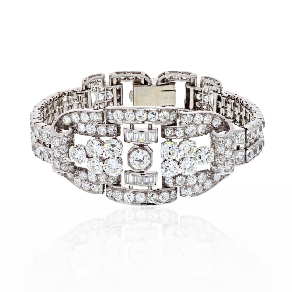 Art Deco Platinum Bracelet 35 Carats Old Cut Diamonds 1930s: Art Deco Platinum Bracelet 35 Carats Old Cut Diamonds 1930s This exquisite Art Deco bracelet showcases the pinnacle of craftsmanship and elegance. Crafted from platinum, the piece features an openwork