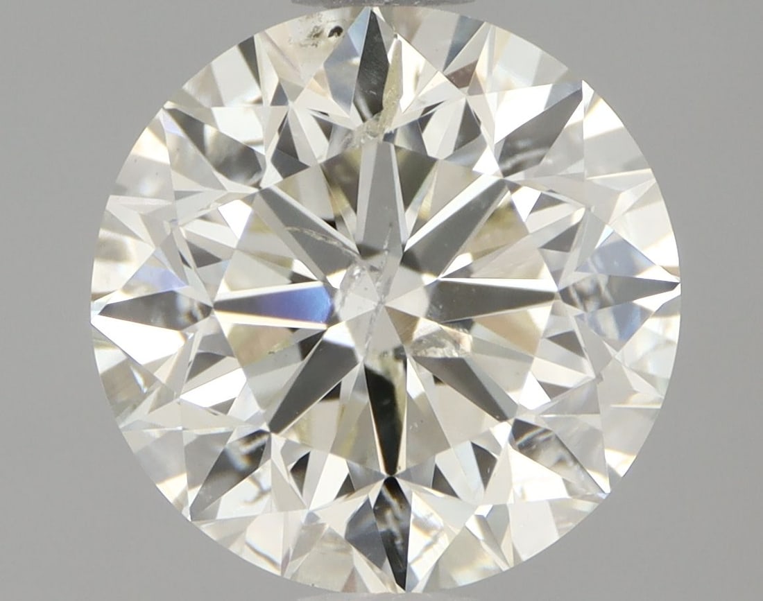 Loose Diamond - ROUND 2.01ct K SI2: Loose Diamond - ROUND 2.01ct K SI2 Source: Natural Shape: ROUND Carats: 2.01 Color: K Clarity: SI2 Certification: IGI Video: