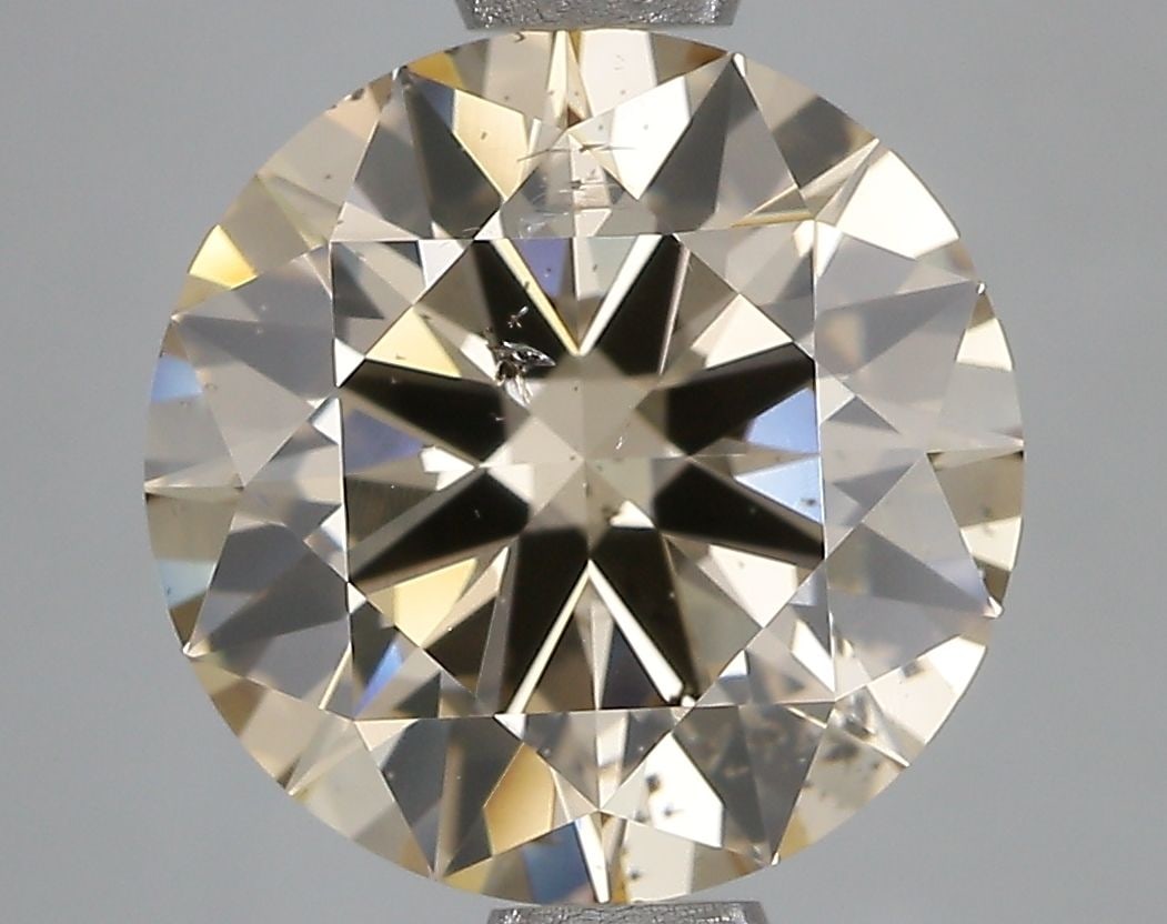 Loose Diamond - ROUND 3.52ct W-X SI2: Loose Diamond - ROUND 3.52ct W-X SI2 Source: Natural Shape: ROUND Carats: 3.52 Color: W-X Certification: IGI Video: