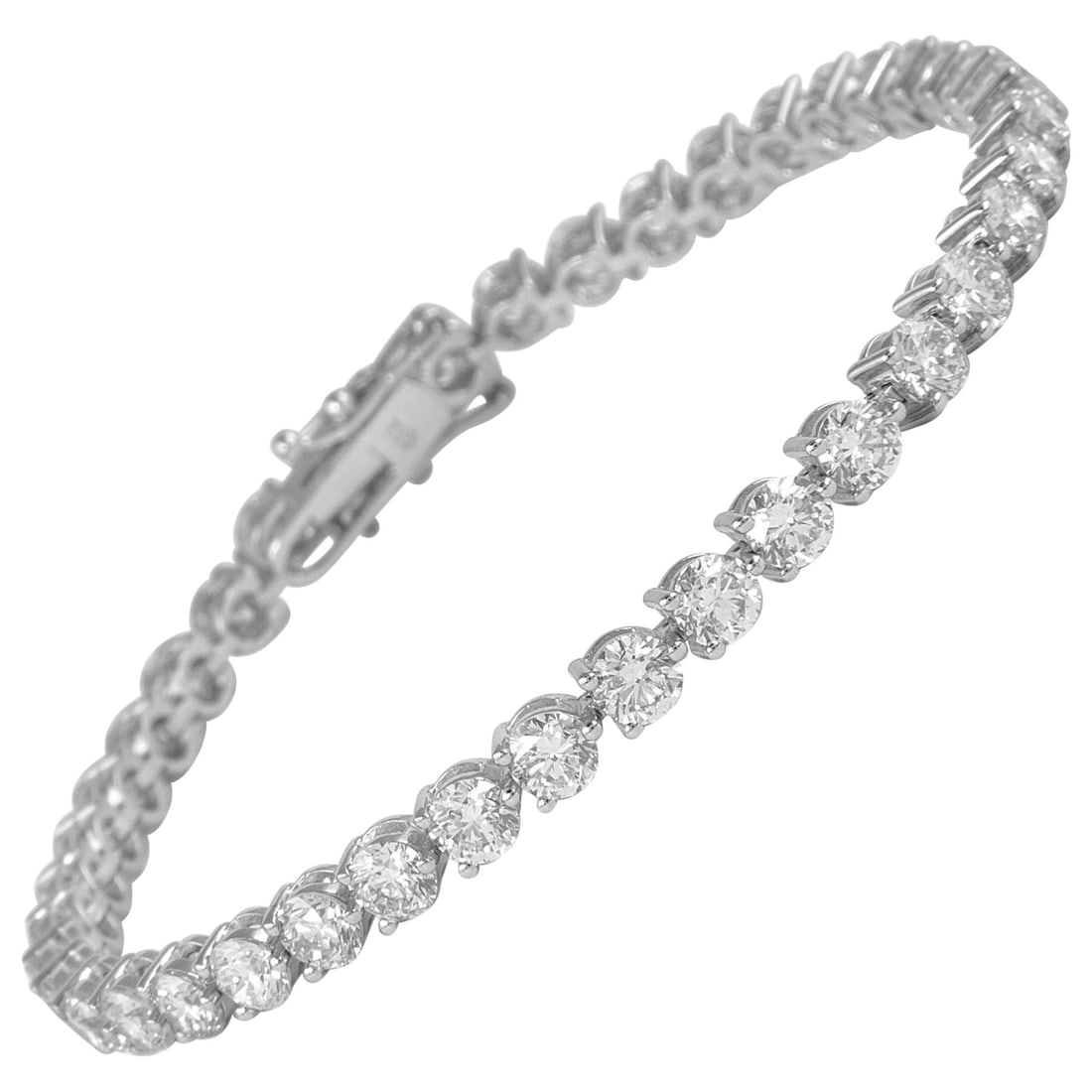 7.57ct Diamond Tennis Bracelet 18k White Gold: 7.57ct Diamond Tennis Bracelet 18k White Gold This exquisite diamond tennis bracelet features 40 round brilliant diamonds totaling 7.57 carats, set in luxurious 18k white gold. With a contemporary des