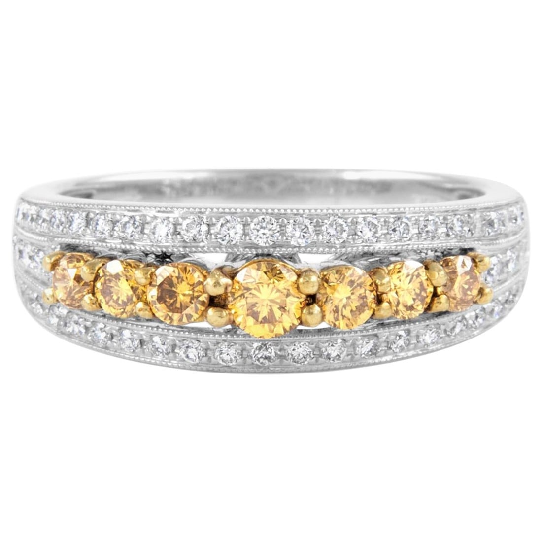 0.90ct Fancy Deep Yellow Diamond Ring 18k Two Tone GIA Appraisal: 0.90ct Fancy Deep Yellow Diamond Ring 18k Two Tone GIA Appraisal This exquisite cocktail ring features a stunning 0.90 carats total diamond weight, showcasing a captivating combination of 7 round bril
