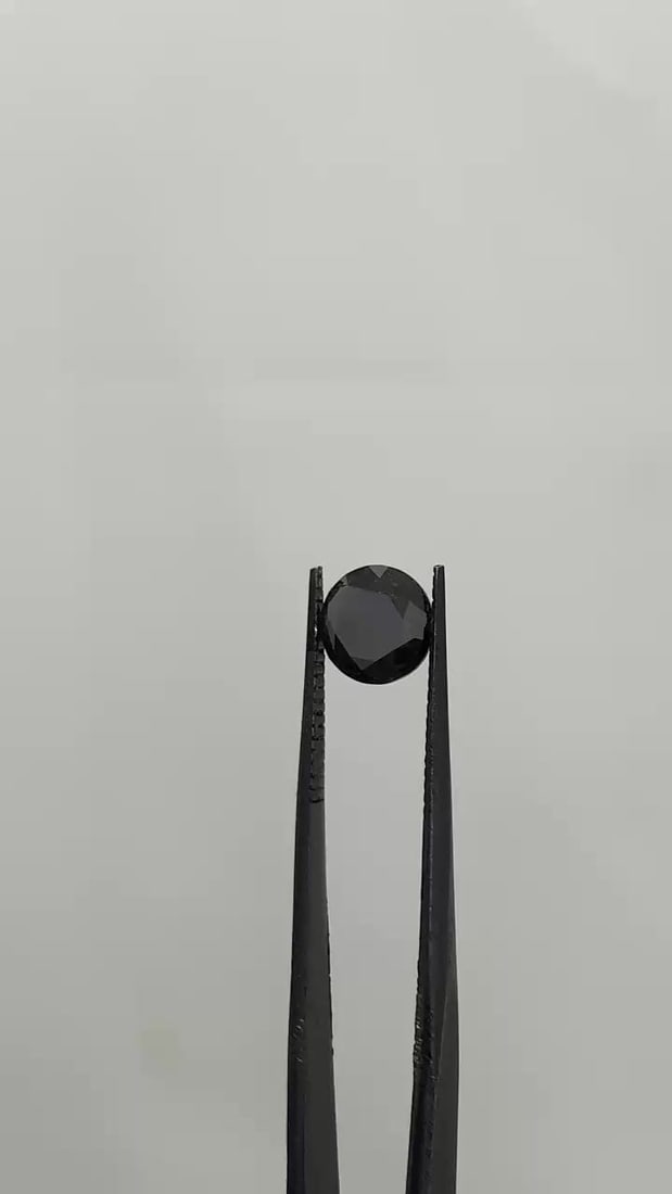 Loose Diamond - ROUND 2.0ct Fancy Black VVS2: Loose Diamond - ROUND 2.0ct Fancy Black VVS2 Source: Natural Shape: ROUND Carats: 2.0 Color: Fancy Black Certification: GIA Video: