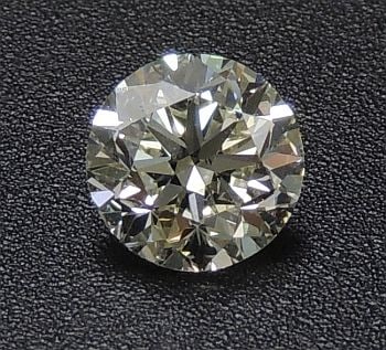 Loose Diamond - ROUND 1.01ct M VS1: Loose Diamond - ROUND 1.01ct M VS1 Source: Natural Shape: ROUND Carats: 1.01 Color: M Clarity: VS1 Certification: IGI The Diamond Depot Guarantee: All items in this auction are guaranteed to be 100% a