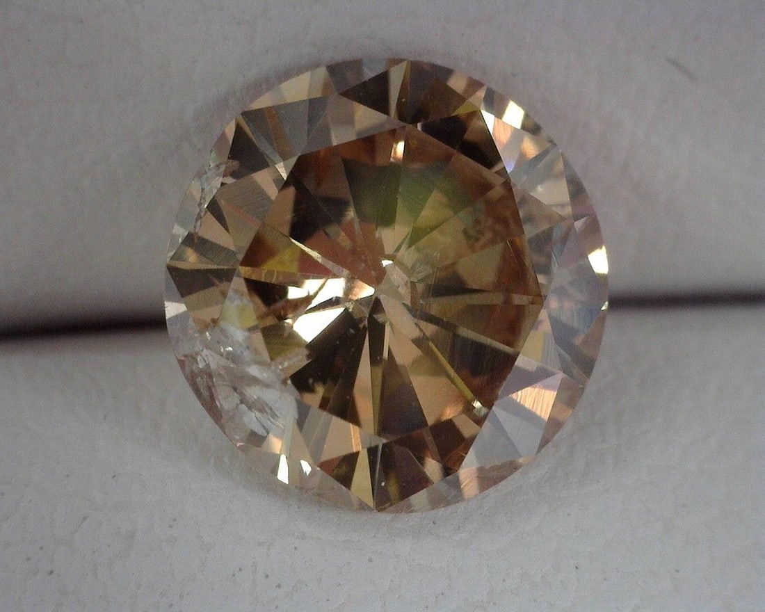 Loose Diamond - ROUND 1.51ct Brown I1: Loose Diamond - ROUND 1.51ct Brown I1 Source: Natural Shape: ROUND Carats: 1.51 Color: Brown Certification: OTHER The Diamond Depot Guarantee: All items in this auction are guaranteed to be 100% authe