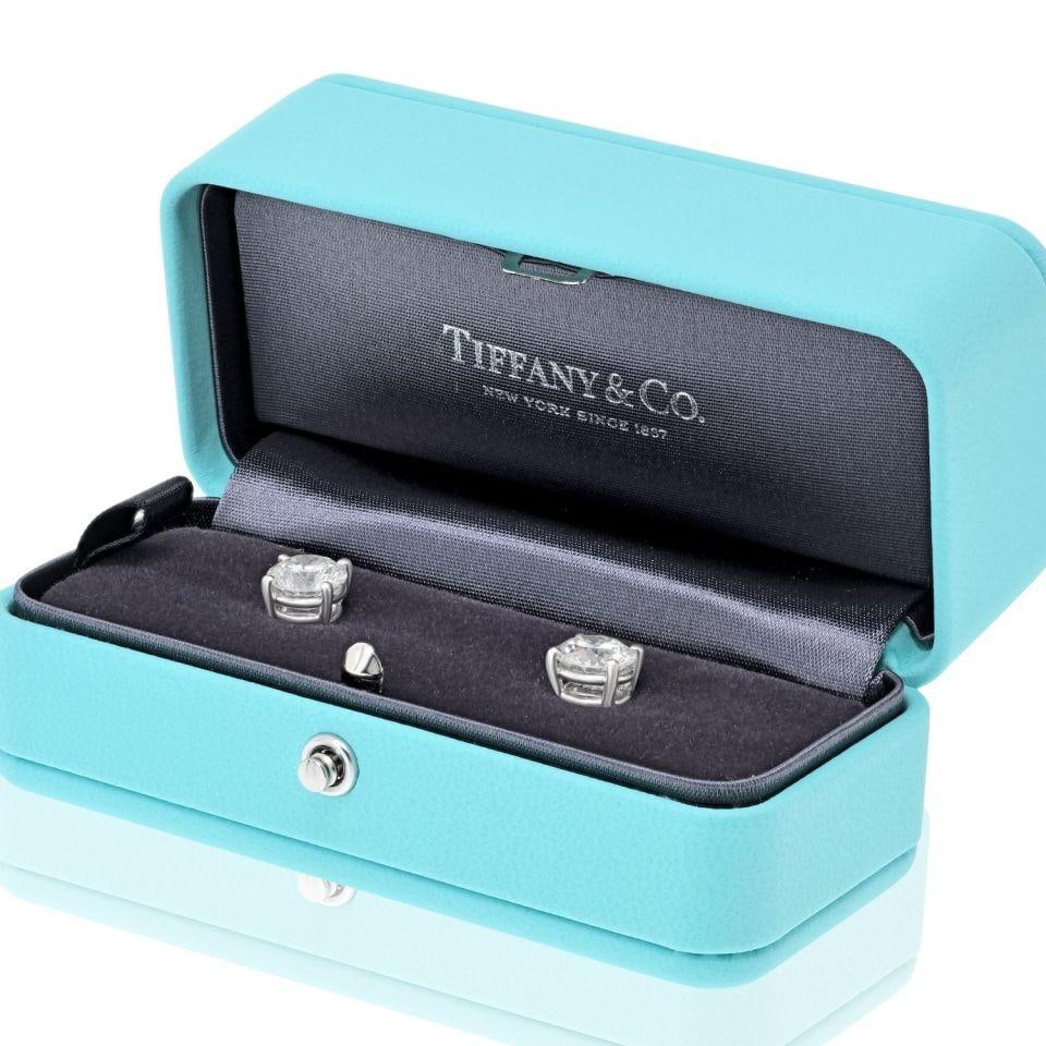 Tiffany & Co. Platinum Diamond Stud Earrings 4.37cttw Certified Full Set: Tiffany & Co. Platinum Diamond Stud Earrings 4.37cttw Certified Full Set Platinum diamond stud earrings featuring two round brilliant-cut diamonds with a combined weight of 4.37 cts. The diamonds are 