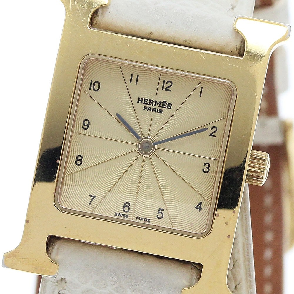 Hermes H Watch Double Tour Quartz Women's Wristwatch: Hermes H Watch Double Tour Quartz Women's Wristwatch This HERMES HH1.201 H-Watch Double Tour is a stylish women's wristwatch featuring a quartz movement. Originating from Switzerland, this pre-owned t