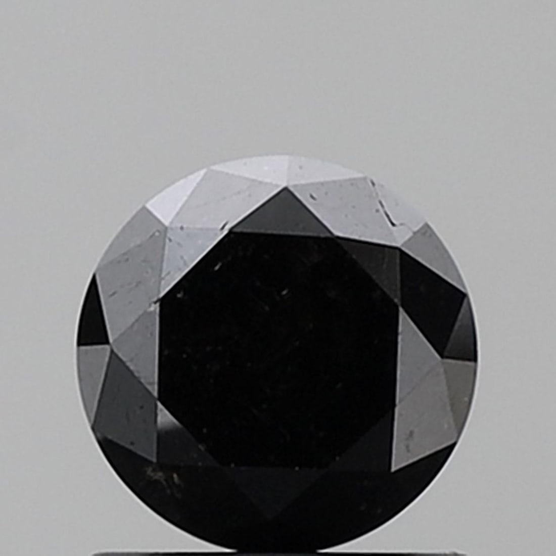 Loose Diamond - ROUND 1.18ct Fancy Black VVS2: Loose Diamond - ROUND 1.18ct Fancy Black VVS2 Source: Natural Shape: ROUND Carats: 1.18 Color: Fancy Black Certification: NONE Video:
