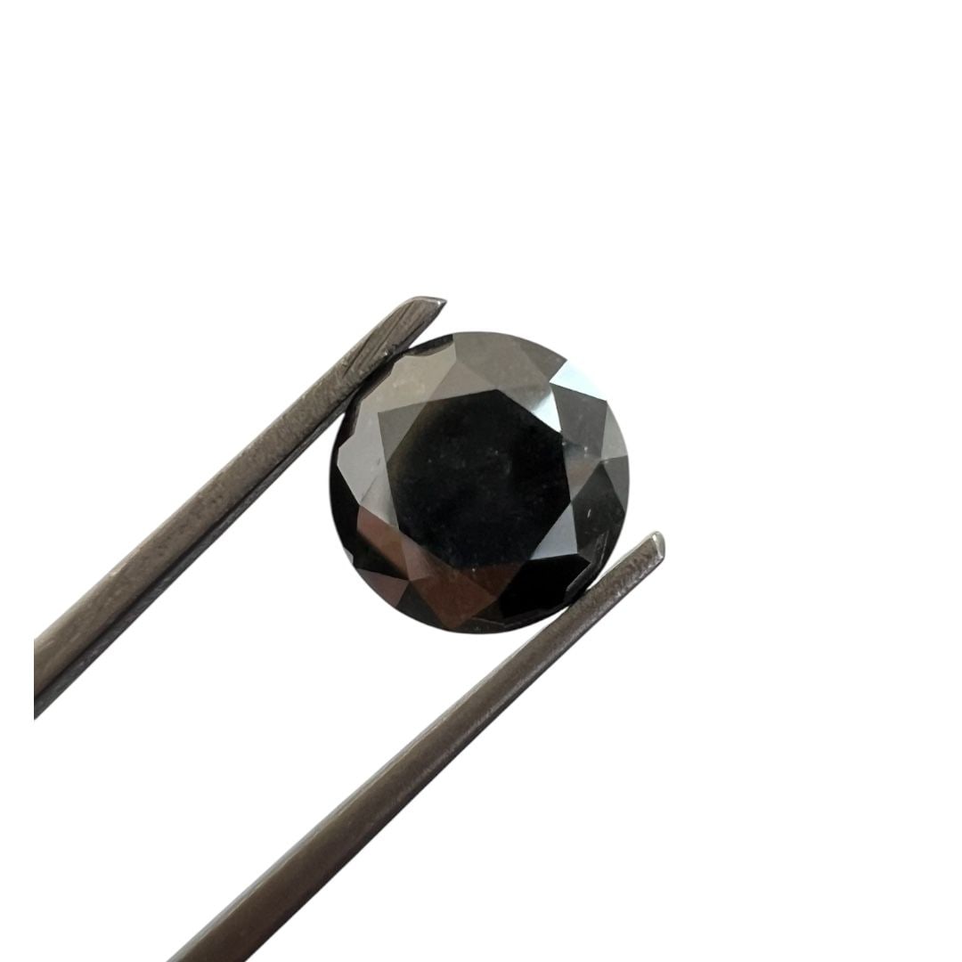 Loose Diamond - ROUND 2.12ct Fancy Black: Loose Diamond - ROUND 2.12ct Fancy Black Source: Natural Shape: ROUND Carats: 2.12 Color: Fancy Black Certification: GIA The Diamond Depot Guarantee: All items in this auction are guaranteed to be 100