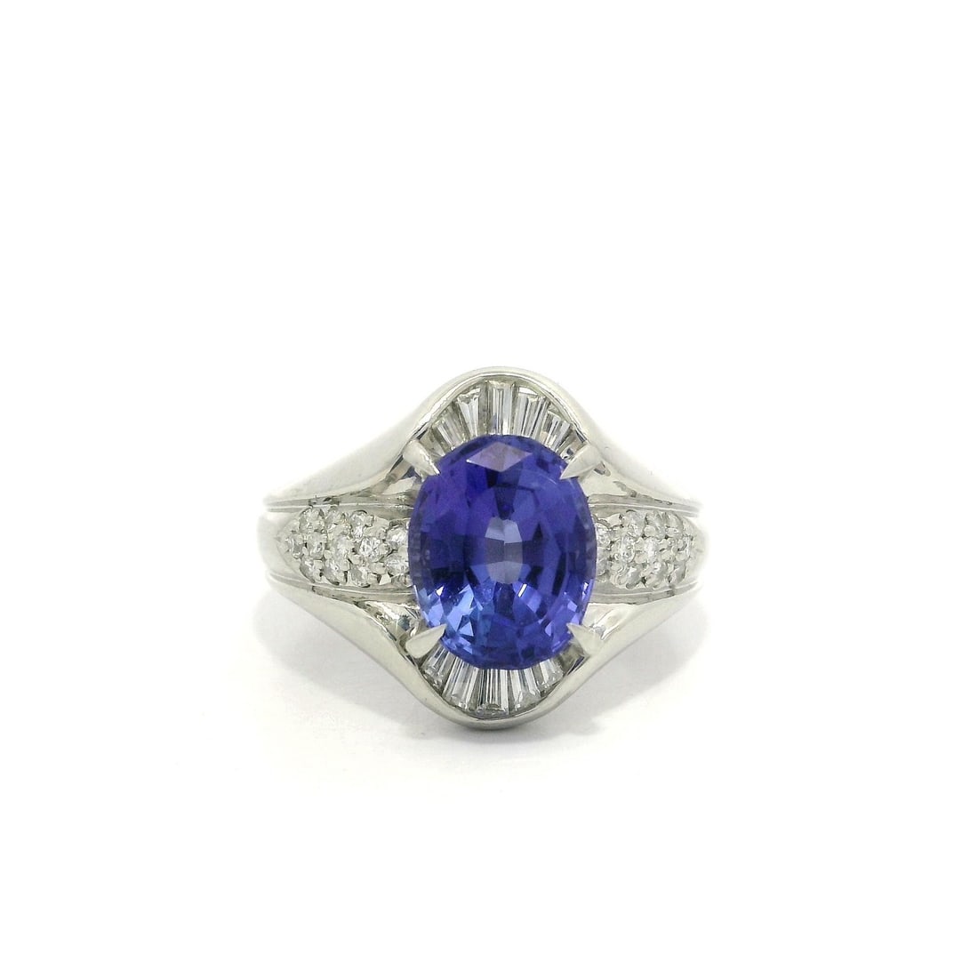 Platinum Ring 2.99ct Oval Violet Blue Tanzanite Diamond Cocktail: Platinum Ring 2.99ct Oval Violet Blue Tanzanite Diamond Cocktail This exquisite cocktail ring is crafted from solid platinum and features a stunning 2.99 carat total weight of natural gemstones. The