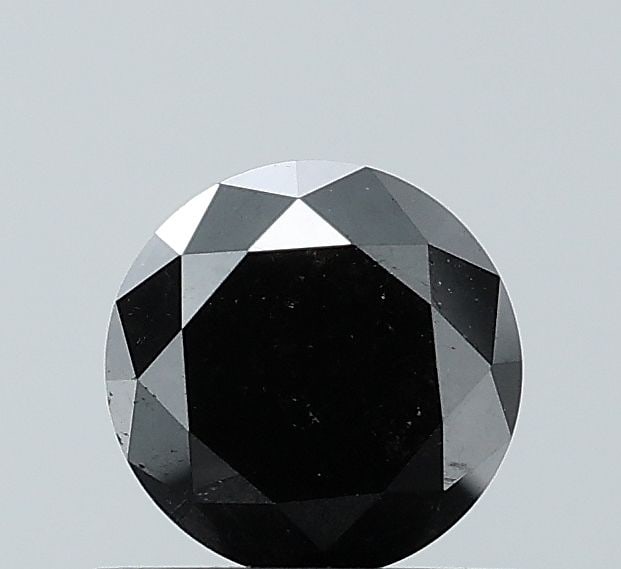 Loose Diamond - ROUND 0.71ct Fancy Black VVS2: Loose Diamond - ROUND 0.71ct Fancy Black VVS2 Source: Natural Shape: ROUND Carats: 0.71 Color: Fancy Black Certification: NONE Video: Video Link The Diamond Depot Guarantee: All items in this auction
