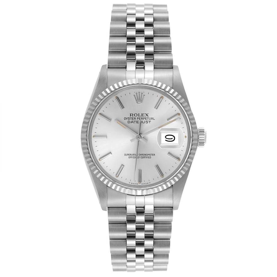 Rolex Datejust 16014 Silver Dial Jubilee Bracelet: Rolex Datejust 16014 Silver Dial Jubilee Bracelet This Rolex Datejust features a silver dial and a fluted bezel, complemented by a D-Link Jubilee bracelet. The watch is designed for men and is identif
