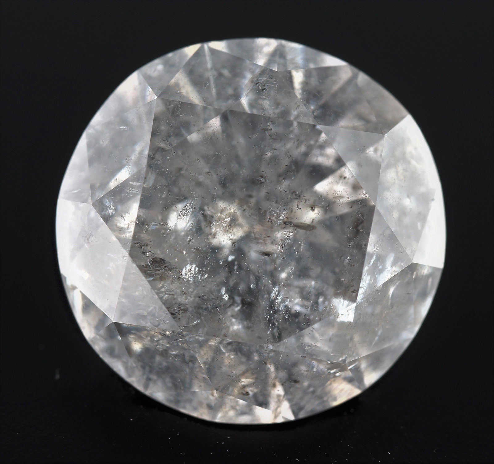 Loose Diamond - ROUND 5.78ct G I3: Loose Diamond - ROUND 5.78ct G I3 Source: Natural Shape: ROUND Carats: 5.78 Color: G Clarity: I3 Certification: NONE The Diamond Depot Guarantee: All items in this auction are guaranteed to be 100% au