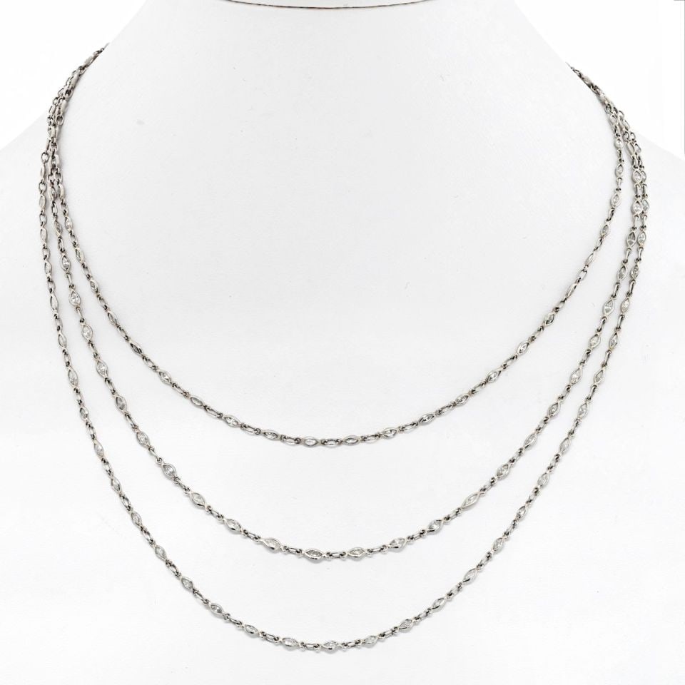 Vintage Platinum Marquise Diamond 56 Inch Diamonds by the Yard Necklace: Vintage Platinum Marquise Diamond 56 Inch Diamonds by the Yard Necklace This vintage platinum necklace features a striking diamonds by the yard design, set with old cut marquise-shaped diamonds totali