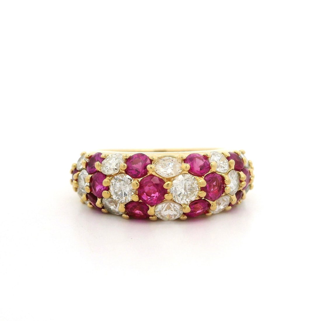 18k Yellow Gold Chevron Band Ring with Ruby and Diamond 2.52ctw: 18k Yellow Gold Chevron Band Ring with Ruby and Diamond 2.52ctw This exquisite 18k Yellow Gold band ring features a stunning domed chevron style design, showcasing a total carat weight of 2.52ctw. The