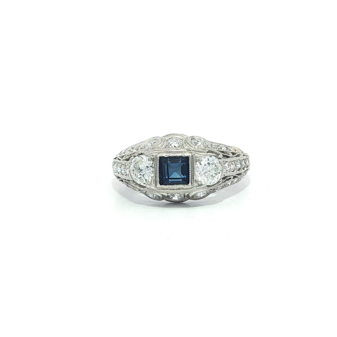 Vintage Art Deco 0.95ctw Diamond Sapphire Platinum Band Ring: Vintage Art Deco 0.95ctw Diamond Sapphire Platinum Band Ring This exquisite Antique Art Deco band ring features a stunning combination of Old European cut diamonds and a striking square sapphire. With