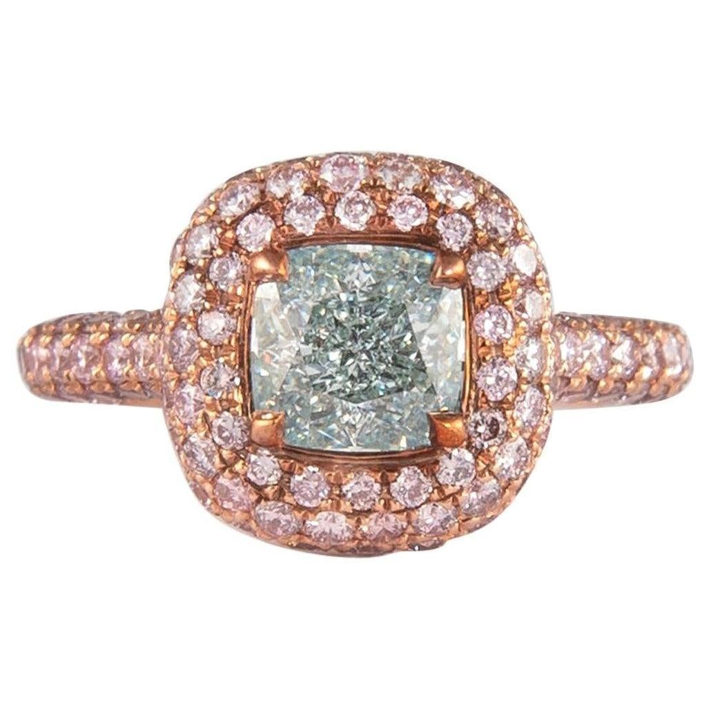 GIA 1.38ct Fancy Blueish Green Pink Diamond Ring 18k Rose Gold: GIA 1.38ct Fancy Blueish Green Pink Diamond Ring 18k Rose Gold Discover the elegance of this stunning GIA certified diamond ring featuring a 1.38 ct fancy light bluish green cushion cut diamond at its
