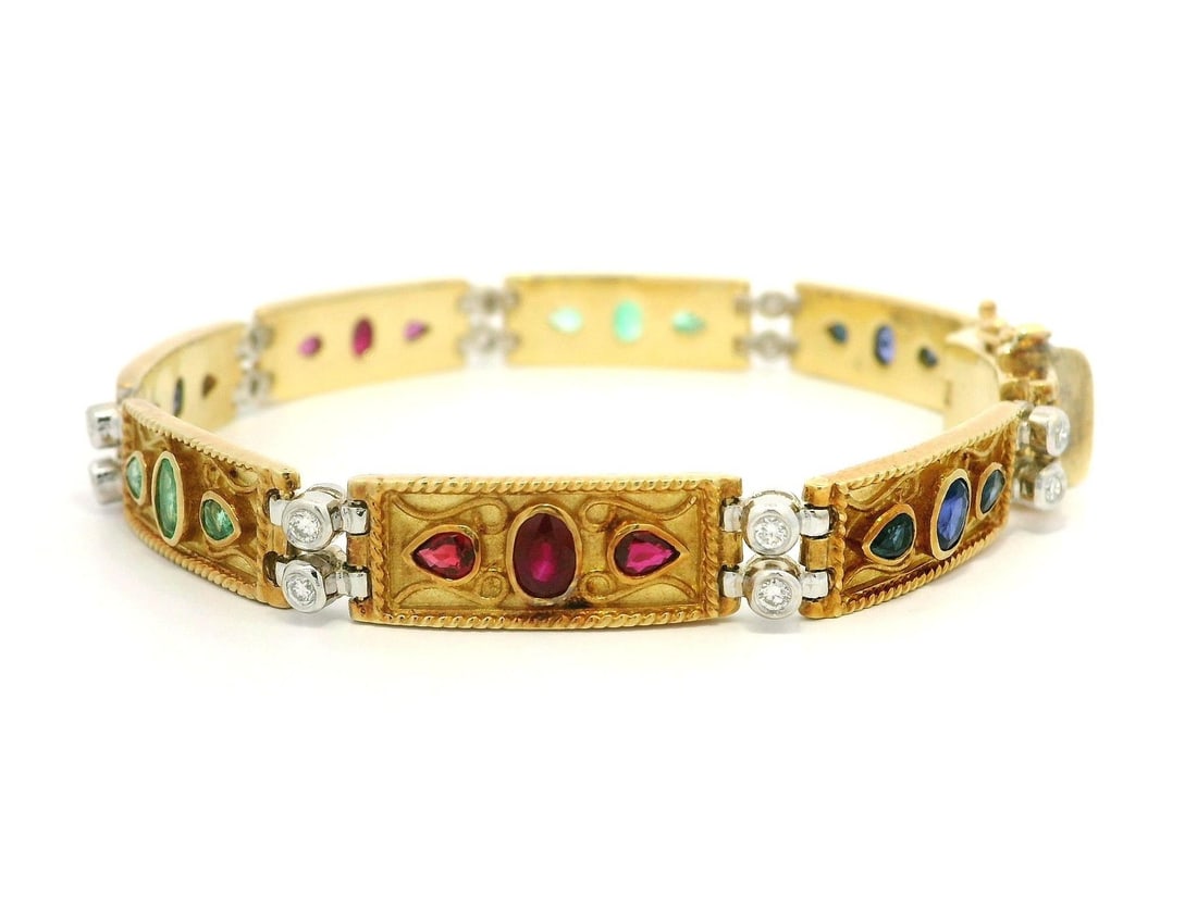 Vintage 18k Yellow Gold Multi-Stone Bracelet with Diamonds: Vintage 18k Yellow Gold Multi-Stone Bracelet with Diamonds This exquisite vintage bracelet features a unique wire work design crafted from solid 18k yellow gold. It showcases a stunning array of natur