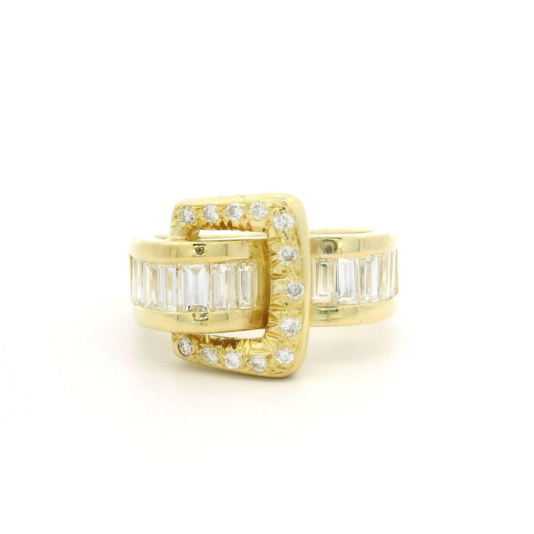 18k Yellow Gold 1.60ct Diamond Buckle Cocktail Ring Size 7: 18k Yellow Gold 1.60ct Diamond Buckle Cocktail Ring Size 7 This stunning 18k yellow gold cocktail ring showcases a total of 1.60 carats of natural diamonds, featuring both straight baguette and round 
