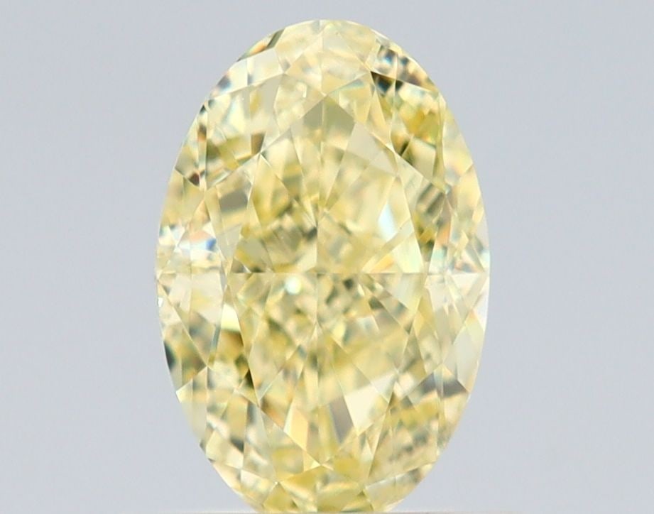 Loose Diamond - OVAL 0.9ct Fancy Yellow VS2: Loose Diamond - OVAL 0.9ct Fancy Yellow VS2 Source: Natural Shape: OVAL Carats: 0.9 Color: Fancy Yellow Certification: GIA Video:
