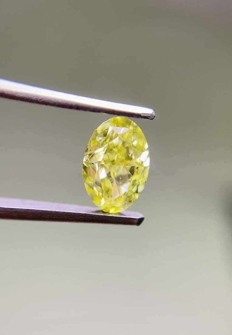 Loose Diamond - OVAL 0.7ct Fancy Intense Yellow SI1: Loose Diamond - OVAL 0.7ct Fancy Intense Yellow SI1 Source: Natural Shape: OVAL Carats: 0.7 Color: Fancy Intense Yellow Certification: GIA Video: